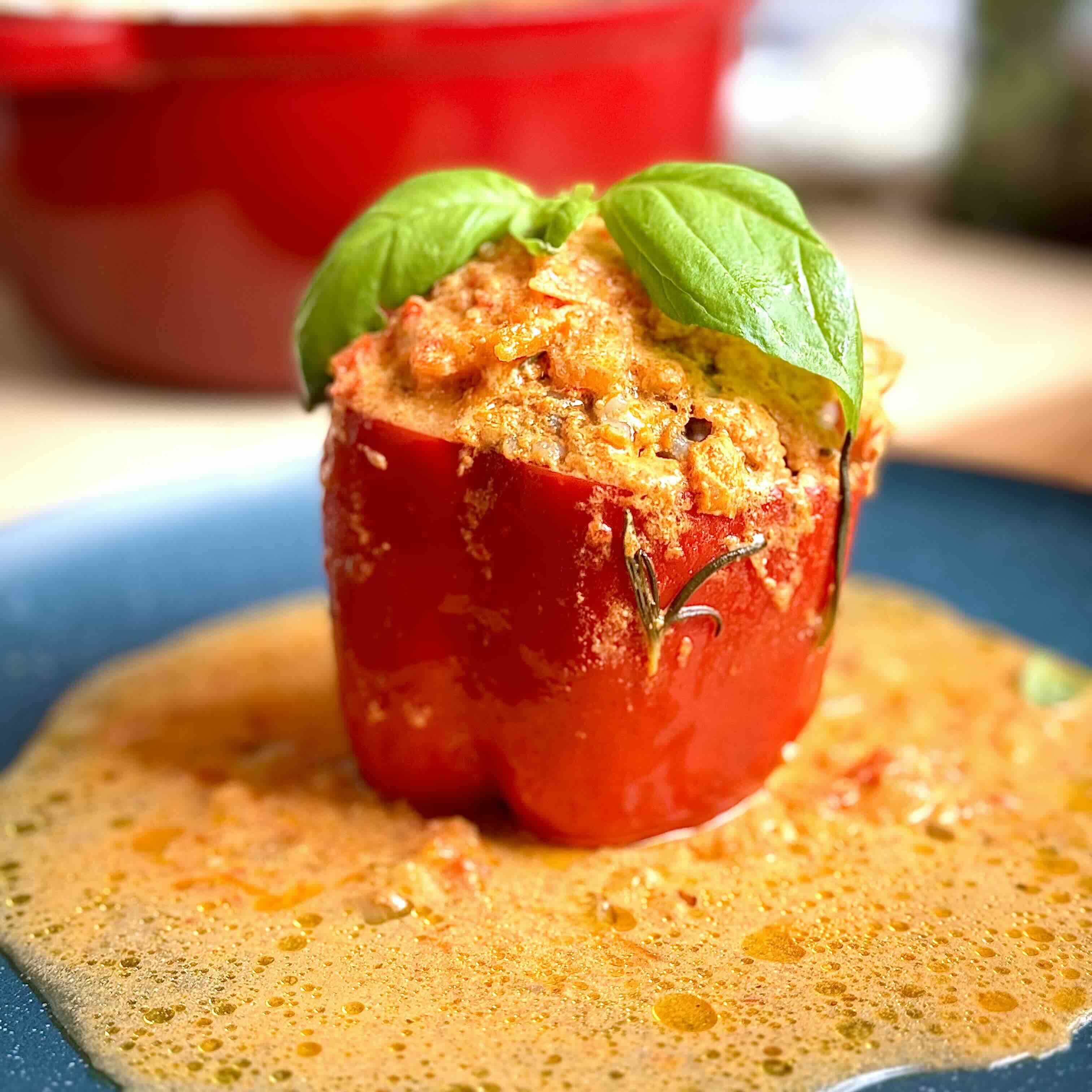 Stuffed Bell Peppers with Meat and Rice in Creamy Tomato Sauce