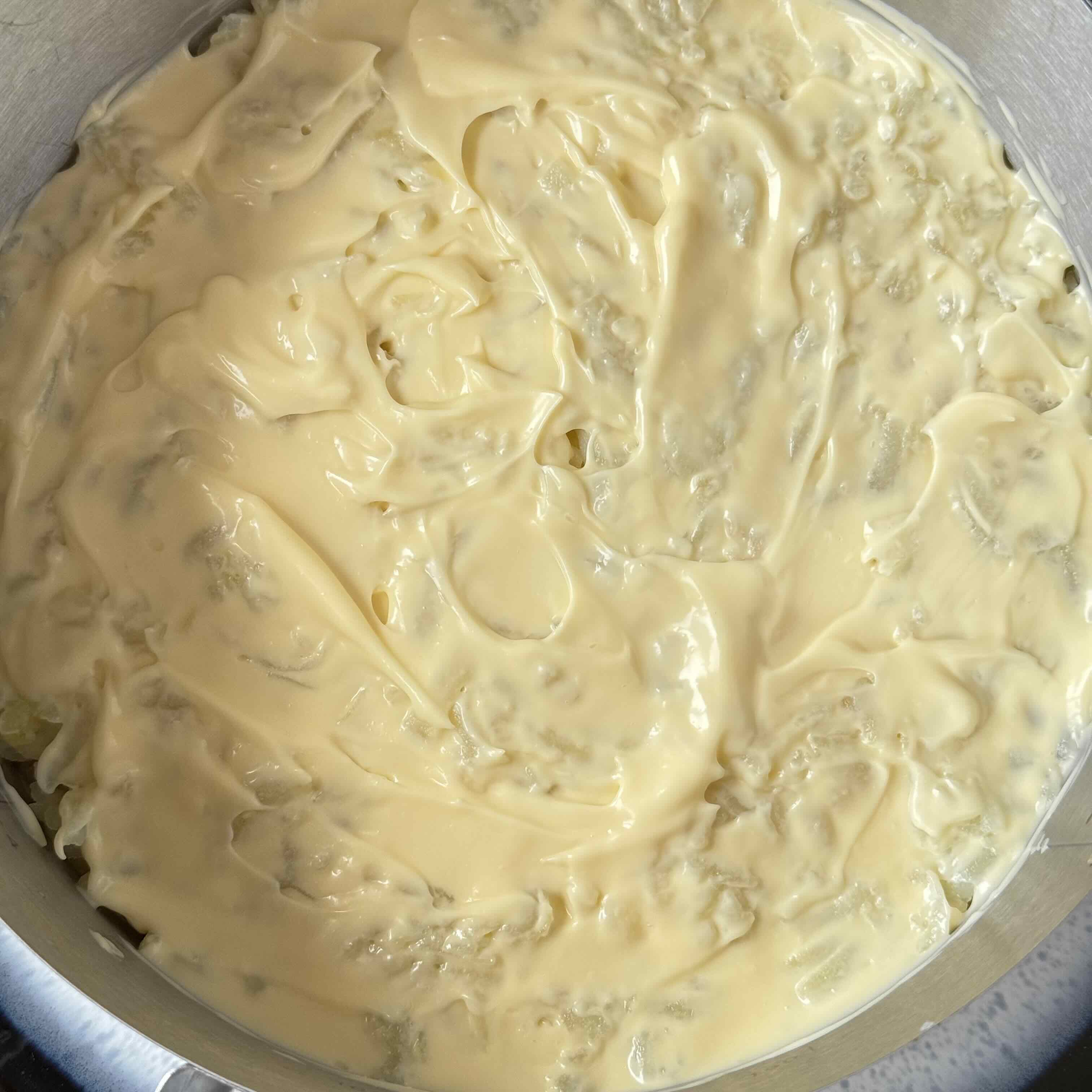 grated boiled potatoes and a layer of mayonnaise