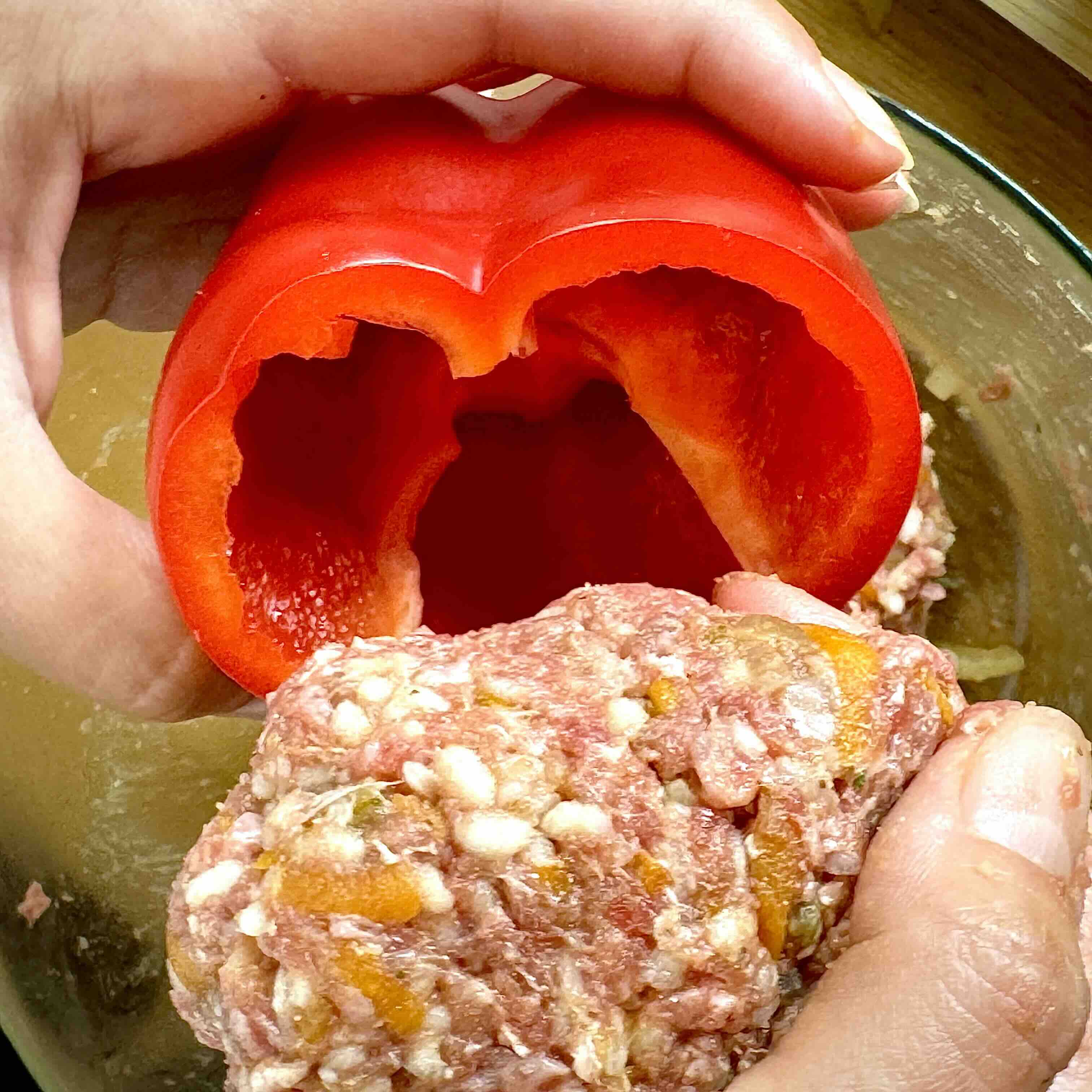 Stuffed bell peppers ready for baking