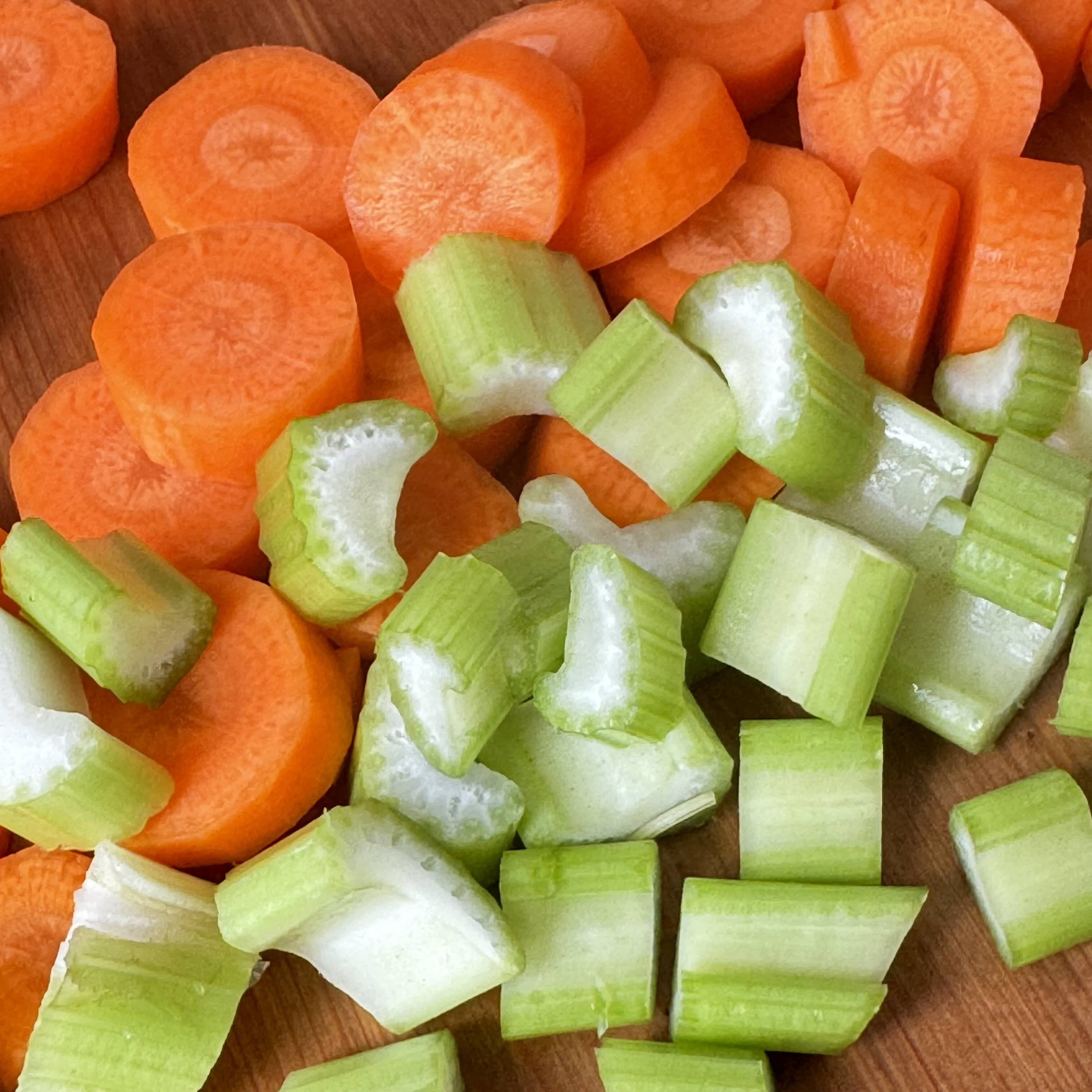 Сarrots, peeled and chopped and stalks of celery, chopped