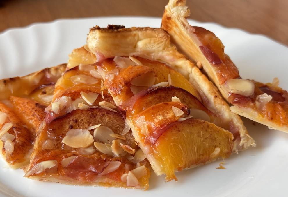  Nectarine and Almond Tart with Maple Syrup on a plate