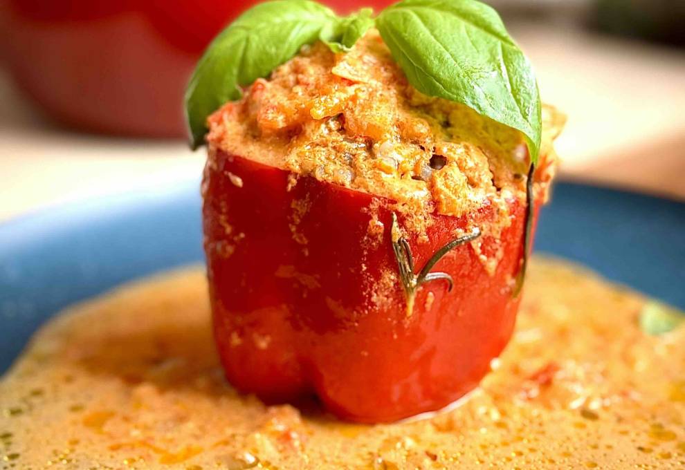 Stuffed Bell Peppers with Meat and Rice in Creamy Tomato Sauce